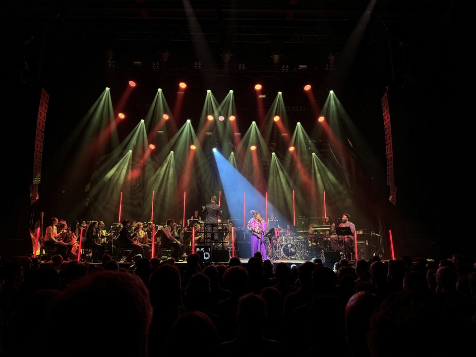 Tank and the Bangas performing live on stage with the Metropole Orchestra