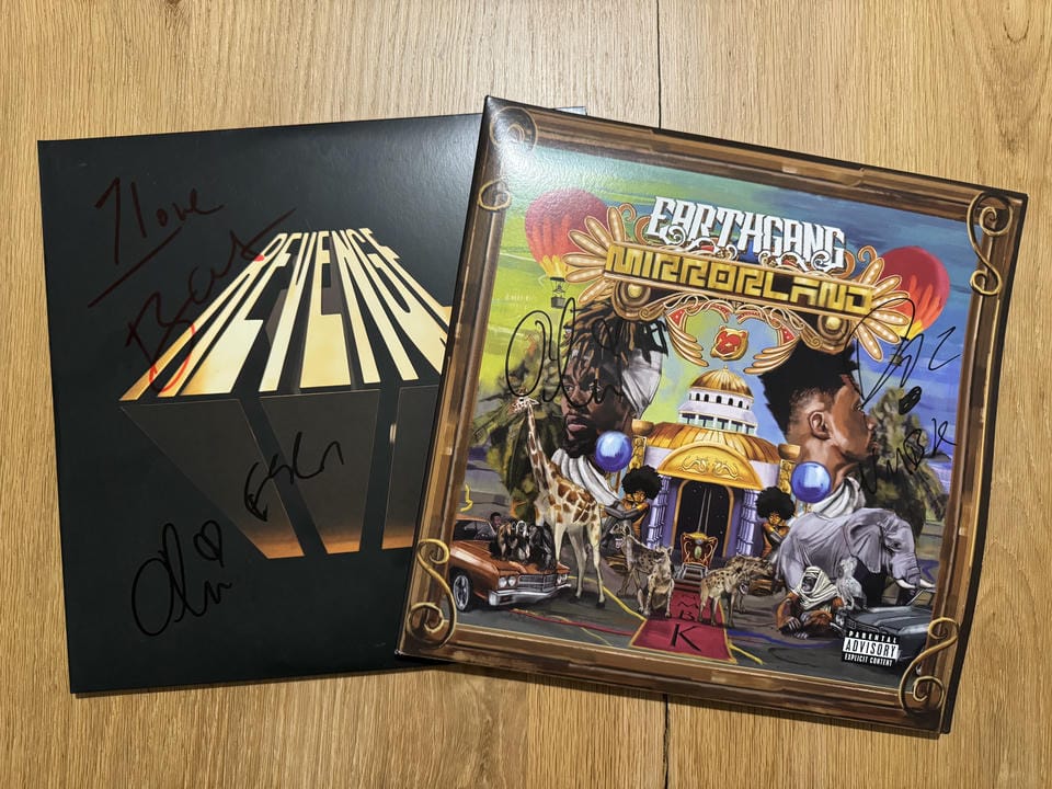 Signed copies of the EarthGang album 'Mirrorland' and Dreamville's 'Revenge of the Dreamers III'