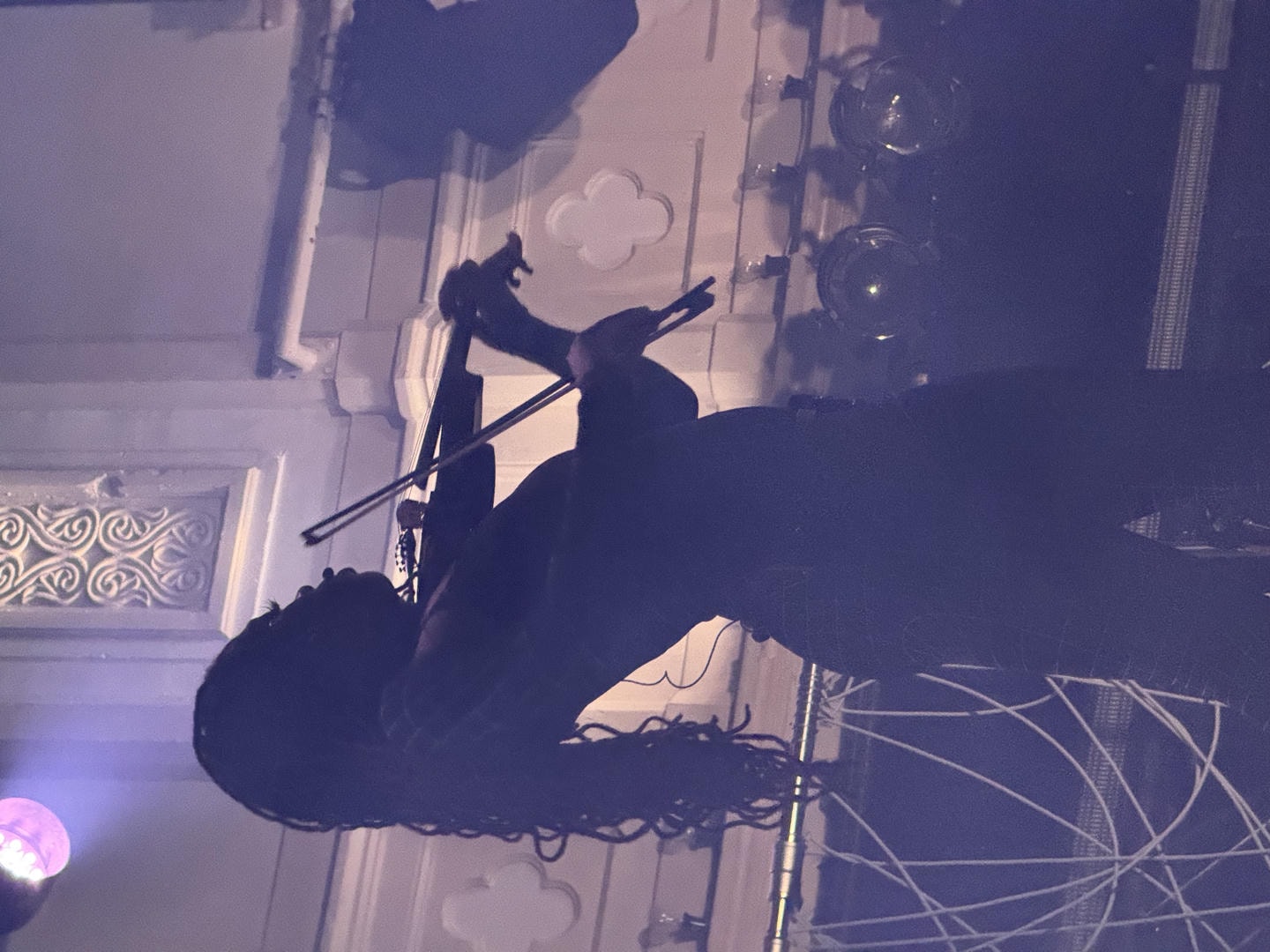 Sudan Archives performing live on stage